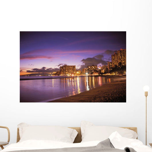 Reflection Of City Lights On The Ocean At Twilight Wall Mural