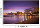 Reflection Of City Lights On The Ocean At Twilight Wall Mural