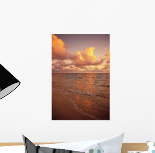 Late Afternoon Light Sreflects Pink Clouds On A Calm Ocean Wall Mural