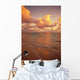 Late Afternoon Light Sreflects Pink Clouds On A Calm Ocean Wall Mural