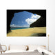 Secluded Beach Seen Through Rock Arch Wall Mural