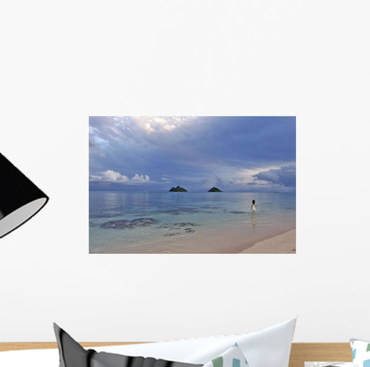 Hawaii, Oahu, Lanikai, A Woman Wades In The Water At The Beach At Dusk Wall Mural