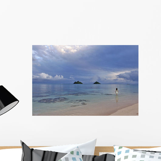 Hawaii, Oahu, Lanikai, A Woman Wades In The Water At The Beach At Dusk Wall Mural