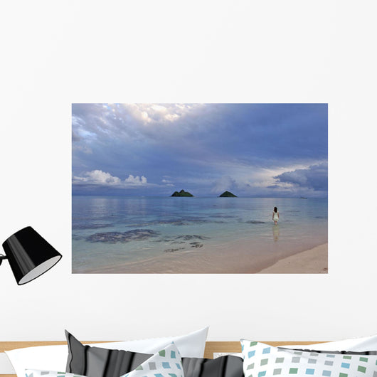 Hawaii, Oahu, Lanikai, A Woman Wades In The Water At The Beach At Dusk Wall Mural