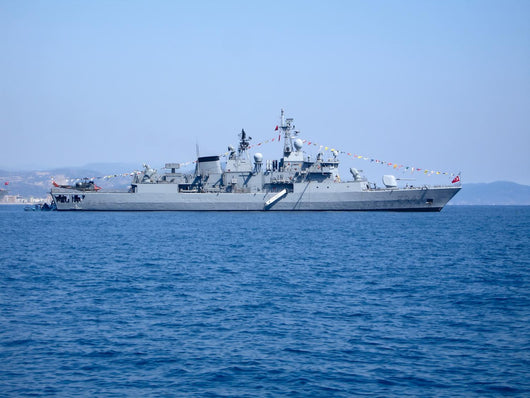 Large Warship on Harbour Raid Wall Mural