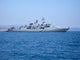 Large Warship on Harbour Raid Wall Mural