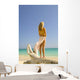 Back View Of Woman Wearing Pareo Stands Wall Mural