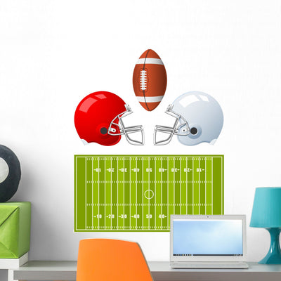 Two Sport Helmets and Wall Decal shown on a wall