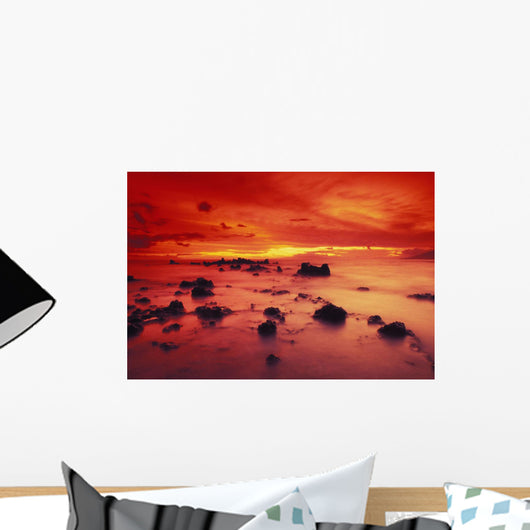 Lava Rock Beach At Sunset With Dramatic Red Yellow Sky And Shore Wall Mural