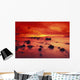 Lava Rock Beach At Sunset With Dramatic Red Yellow Sky And Shore Wall Mural