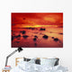 Lava Rock Beach At Sunset With Dramatic Red Yellow Sky And Shore Wall Mural