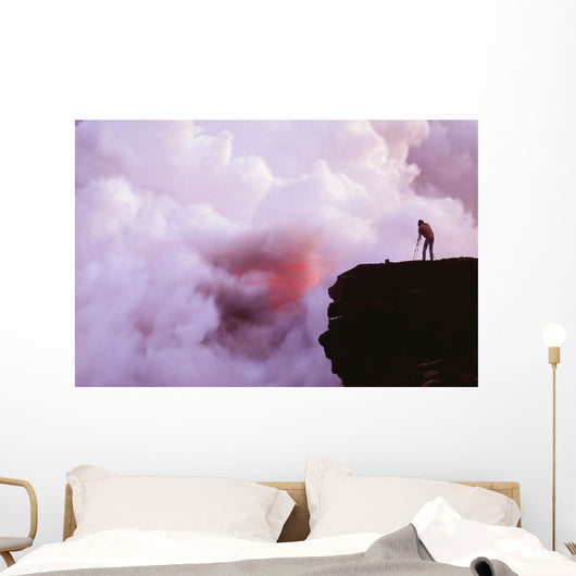 Photographer On Lava Table Filming Lava Flow Into Ocean Wall Mural