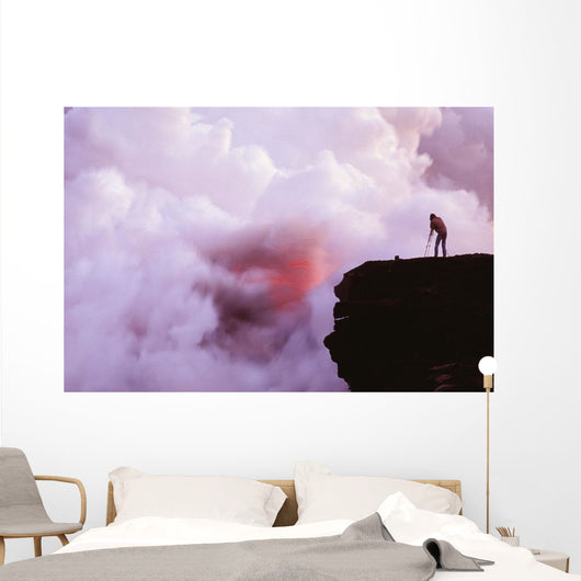 Photographer On Lava Table Filming Lava Flow Into Ocean Wall Mural