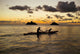 Man And Dog On A One-Man Outrigger Canoe At Sunset Wall Mural