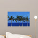 Hawaii, Palm Tree Tops Against Blue Sky And Ocean Wall Mural