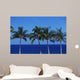 Hawaii, Palm Tree Tops Against Blue Sky And Ocean Wall Mural