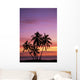Cluster Of Palm Trees With Beautiful Sunset Background Wall Mural