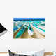 Hawaii, Oahu, Lanikai, Outrigger Canoes Stacked Along The Beach Wall Mural
