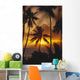 French Polynesia, Tahiti, Palm Trees Silhouetted By A Vibrant Sunset Wall Mural