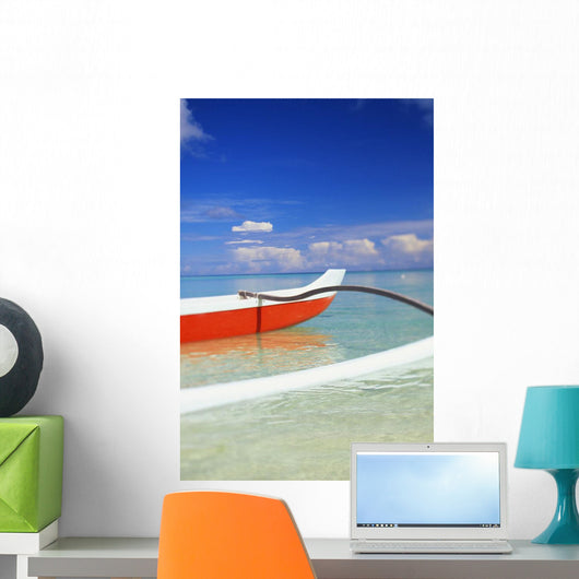 Red And White Outrigger Canoe Floating On Calm Turquoise Water Wall Mural