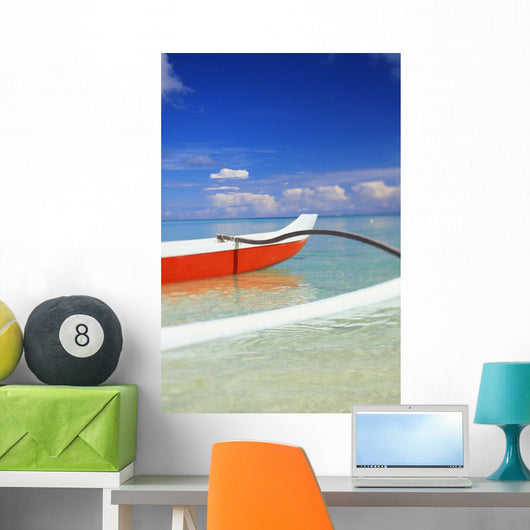Red And White Outrigger Canoe Floating On Calm Turquoise Water Wall Mural