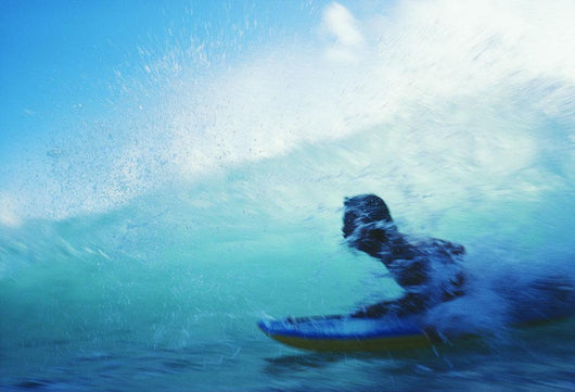 Hawaii, Oahu, Waikiki, Boogieboarder Riding Inside Wave Wall Mural