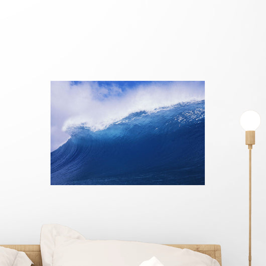 Blue Wave Curling Over Forming Barrel With White Waters Wall Mural