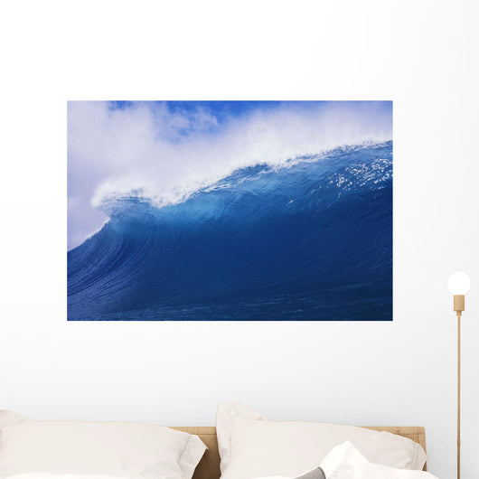 Blue Wave Curling Over Forming Barrel With White Waters Wall Mural