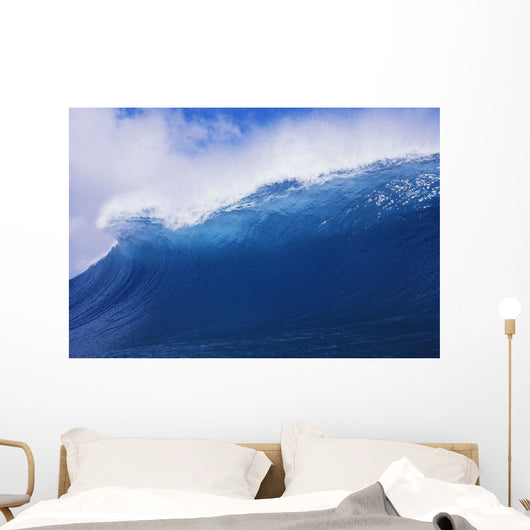 Blue Wave Curling Over Forming Barrel With White Waters Wall Mural