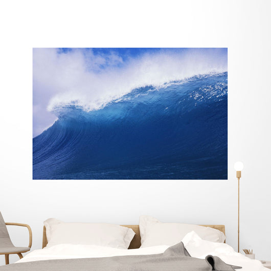 Blue Wave Curling Over Forming Barrel With White Waters Wall Mural