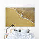 Close-Up Of Gentle Waves Washing Onto Sandy Tropical Beach Wall Mural