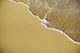 Close-Up Of Gentle Waves Washing Onto Sandy Tropical Beach Wall Mural