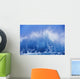 Blue Waves Crashing On The Shore With Blue Sky Background Wall Mural