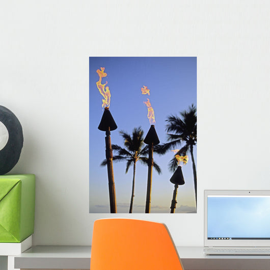 Hawaii, Tiki Torches Lit At Dusk, Palm Trees And Blue Sky Wall Mural