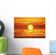 View Of Huge Orange Sun Sinking Towards The Horizon Wall Mural