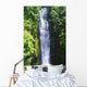 Waterfall Surrounded By Lush Greenery Wall Mural