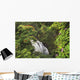 Waterfall Surrounded By Tropical Flowers And Plants Wall Mural