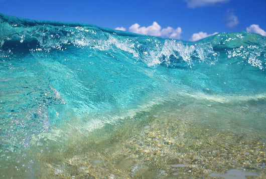 Ripple Of Crystal Clear And Turquoise Water Breaks On Sandy Shore Wall Mural