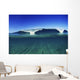 Wave Breaking In Distance, Glassy Turqouise Water In Foreground Wall Mural