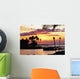 Orange Sunset With Palm Trees And Tiki Torches Wall Mural