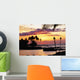 Orange Sunset With Palm Trees And Tiki Torches Wall Mural