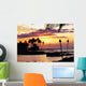 Orange Sunset With Palm Trees And Tiki Torches Wall Mural