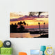 Orange Sunset With Palm Trees And Tiki Torches Wall Mural