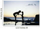 Mother And Daughter Silhouetted In Tidepool At Sunset Wall Mural