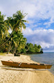 French Polynesia, Tahiti, White Sand Beach With Palm Trees And Canoe Wall Mural