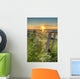 Sunset Over Water And A Fence Along The Shoreline Wall Mural