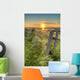 Sunset Over Water And A Fence Along The Shoreline Wall Mural