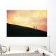 Hawaii, Couple Running Along A Hill At Sunset Wall Mural