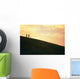 Hawaii, Couple Running Along A Hill At Sunset Wall Mural