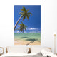 Palm Trees Lean And Cast Shadow On Beach Wall Mural